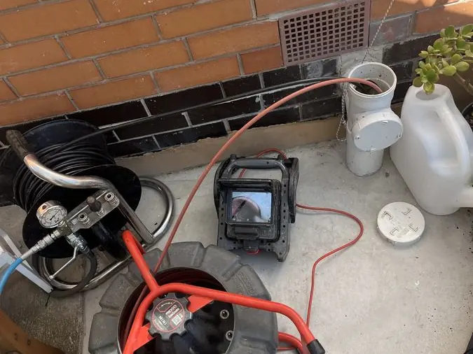 Drain camera equipment beside a toilet, Elwood